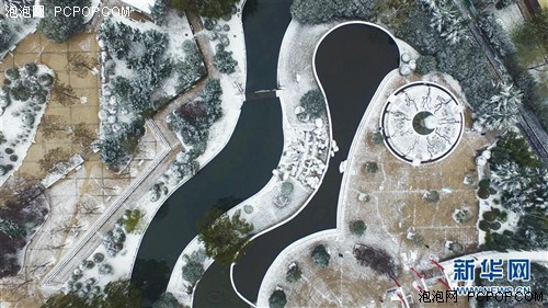 航拍初雪济南:泉城一片银装素裹 